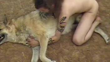 Tattooed man and his lovely doggy fuck on the carpet