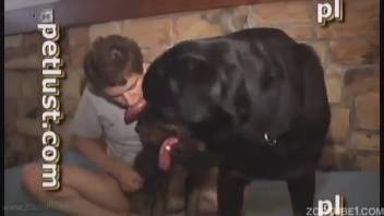 Incredible homemade bestiality scene with a black dog and animal lover