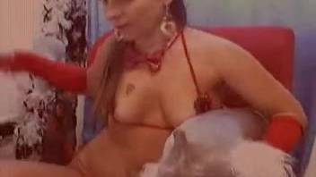 Attractive lady engages in oral intercourse with small companion on webcam