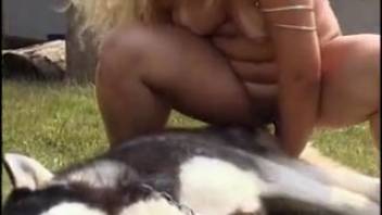 Golden-haired adult woman mounts canine dick in wild garden fetish porn