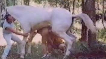Curly mature lady getting fucked by a hung horse