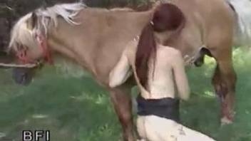 Naked hottie uses giant horse dick for sexual desires