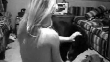 Needy blonde filmed in homemade zoophilia fucking with the dog