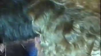 Attractive blondie performs oral on a dog's penis in an incredibly steamy bestiality exhibition.