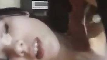 Dark-haired beauty gets face-fucked in a zoo video