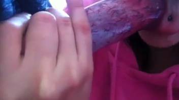 Brunette woman eagerly deepthroats a stunning beast's cock