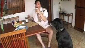 Excited older woman becomes close with her pet dog in a live solo session