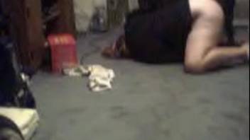 Homemade footage of a sexy mature woman instructing her pet dog on a secret camera