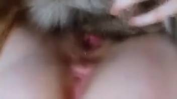 Steamy stud fills her rosy slit with cream in a sexy manner