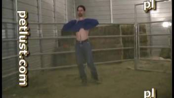 Farmer pounded a lustful stallion in the doggy position.