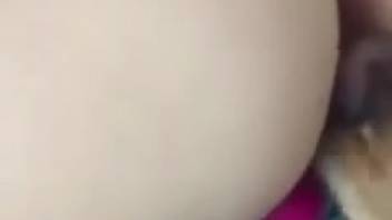 Naked woman's butt tongued by dog in solo webcam self-pleasure session