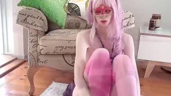 Pink hair hottie lifts up her skirt to take dog cock